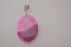 Pink dyed agate gemstone pendant