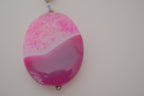 Pink dyed agate gemstone pendant