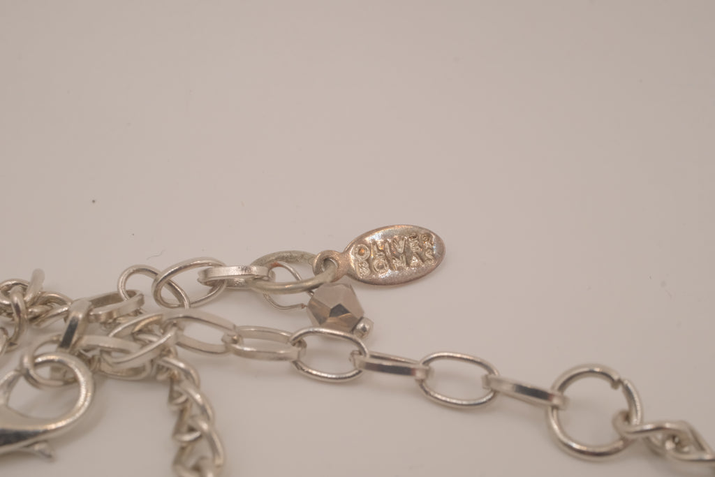 Antique-inspired, silver-toned filigree bib necklace