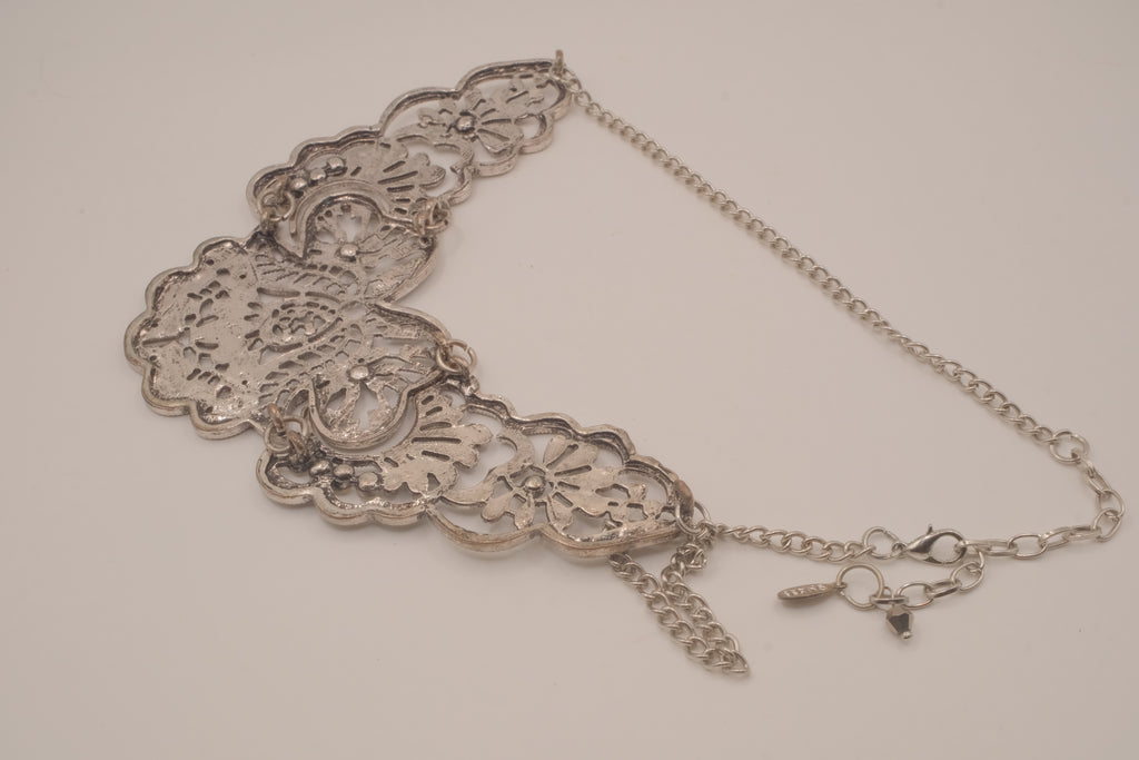 Antique-inspired, silver-toned filigree bib necklace