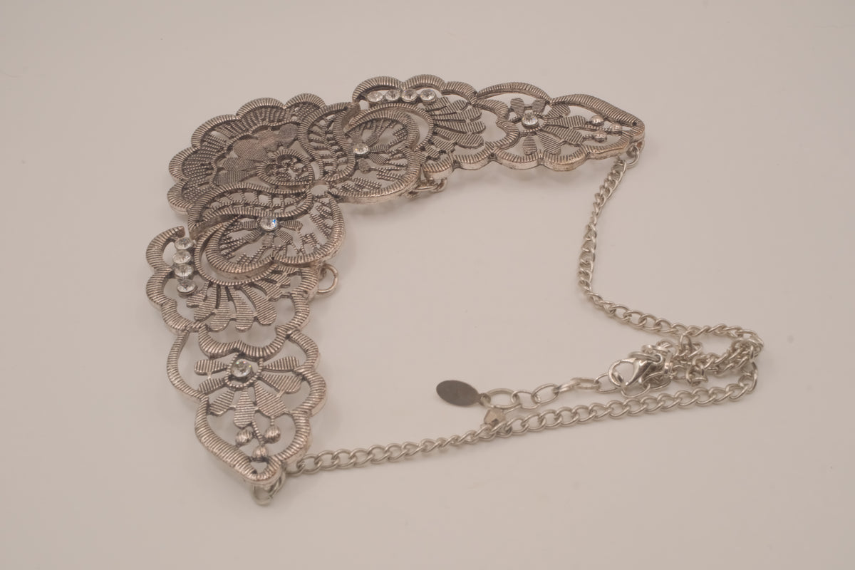 Antique-inspired, silver-toned filigree bib necklace