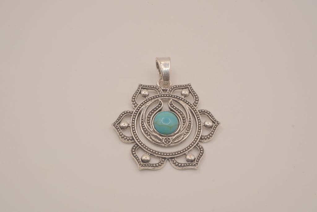 Ornate silver lotus flower mandala pendant