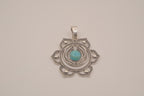 Ornate silver lotus flower mandala pendant