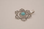 Ornate silver lotus flower mandala pendant