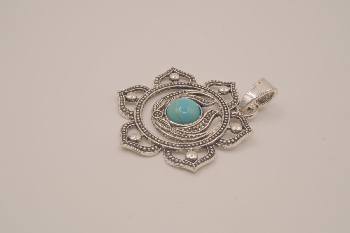 Ornate silver lotus flower mandala pendant