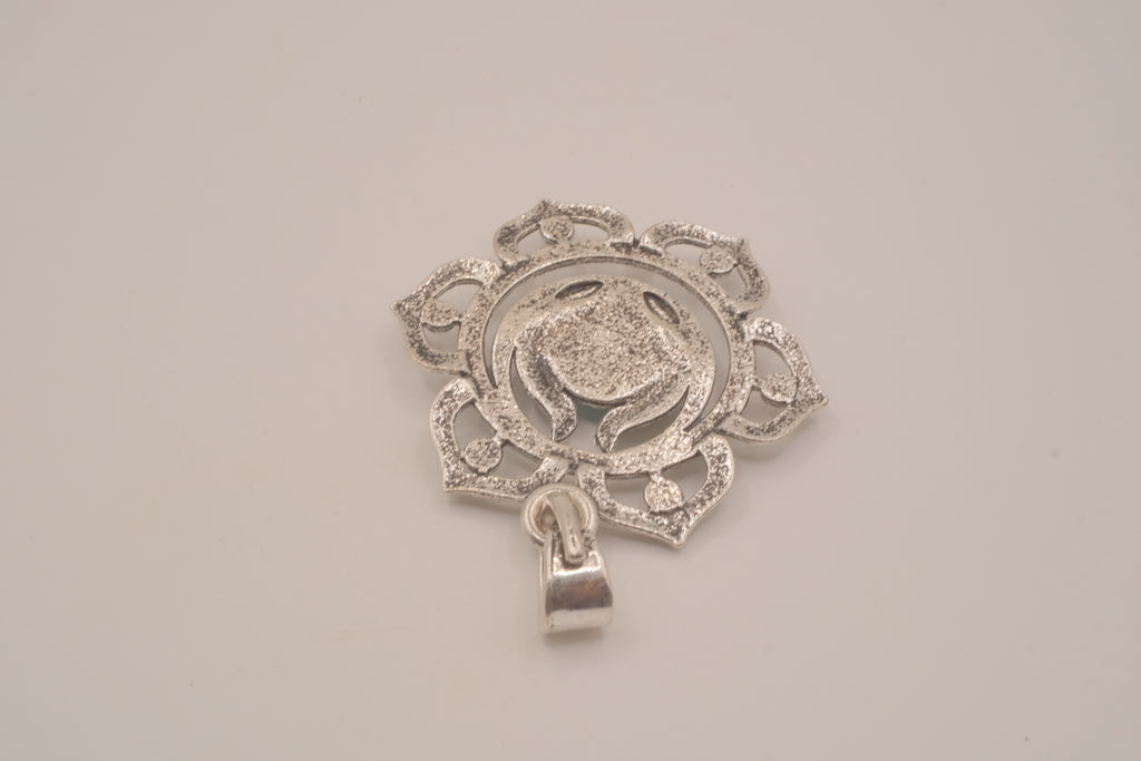Ornate silver lotus flower mandala pendant