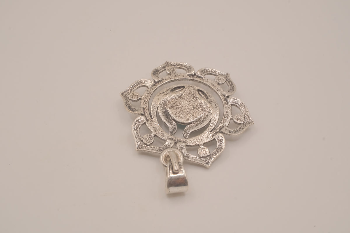 Ornate silver lotus flower mandala pendant