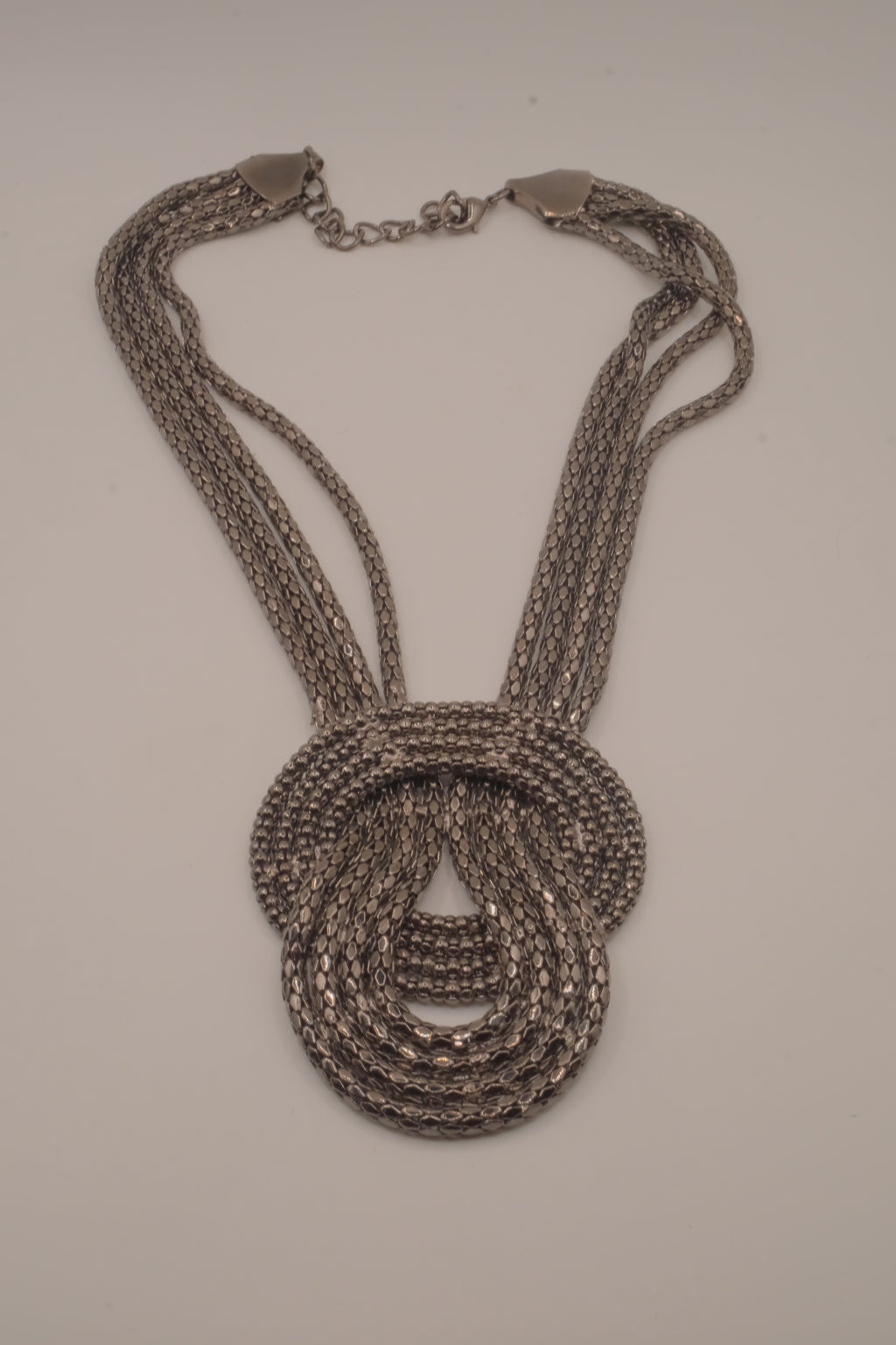 Vintage multi-strand gunmetal mesh statement knot necklace