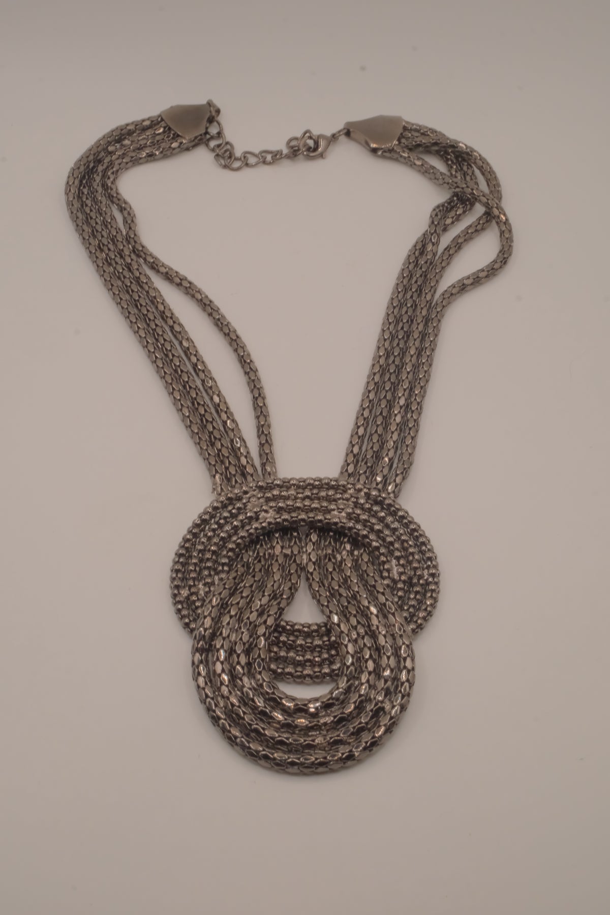 Vintage multi-strand gunmetal mesh statement knot necklace
