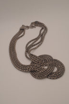Vintage multi-strand gunmetal mesh statement knot necklace