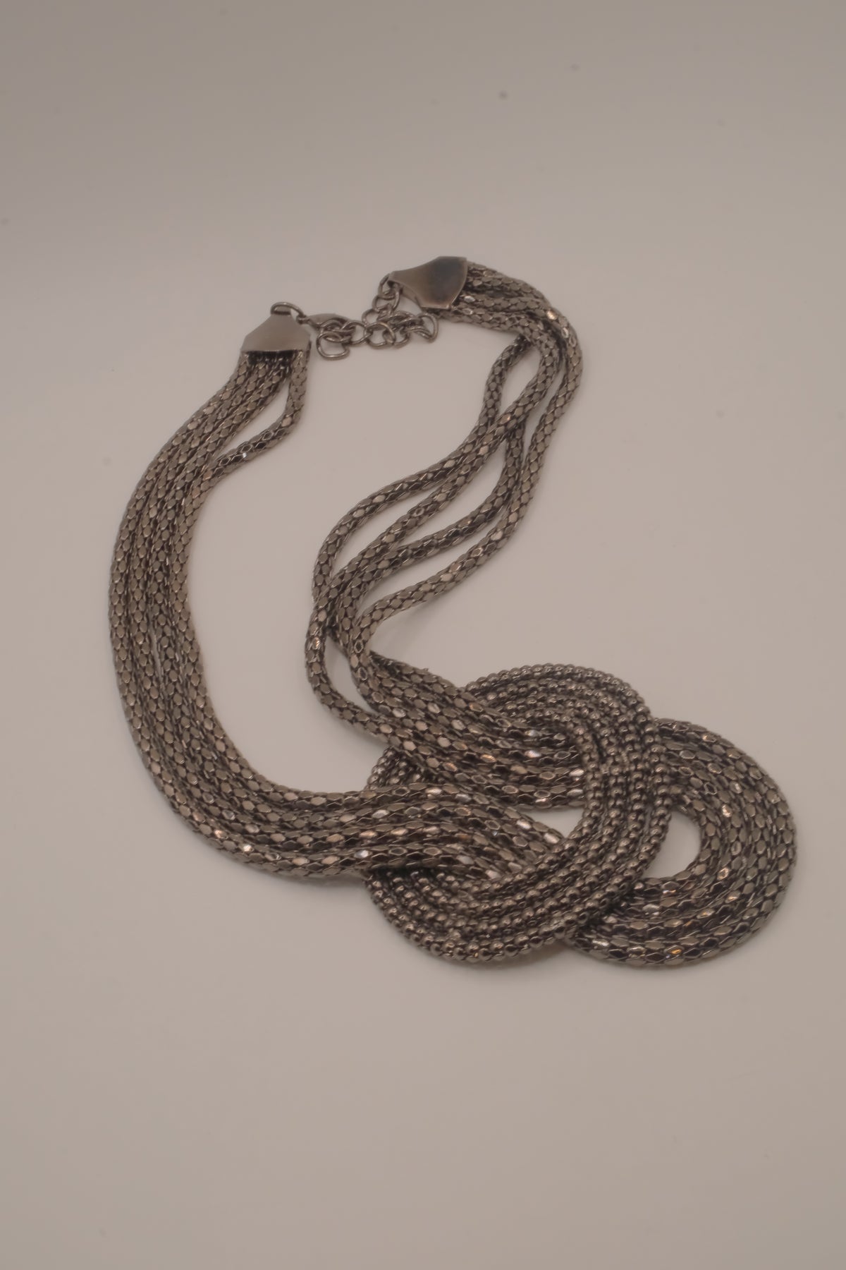 Vintage multi-strand gunmetal mesh statement knot necklace
