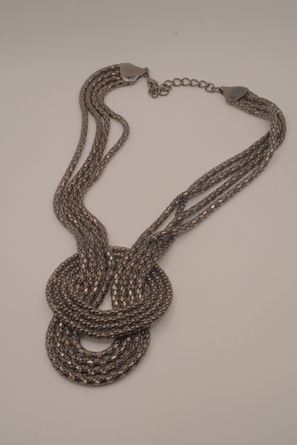 Vintage multi-strand gunmetal mesh statement knot necklace