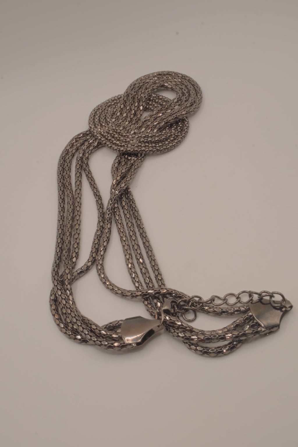 Vintage multi-strand gunmetal mesh statement knot necklace