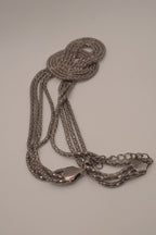 Vintage multi-strand gunmetal mesh statement knot necklace