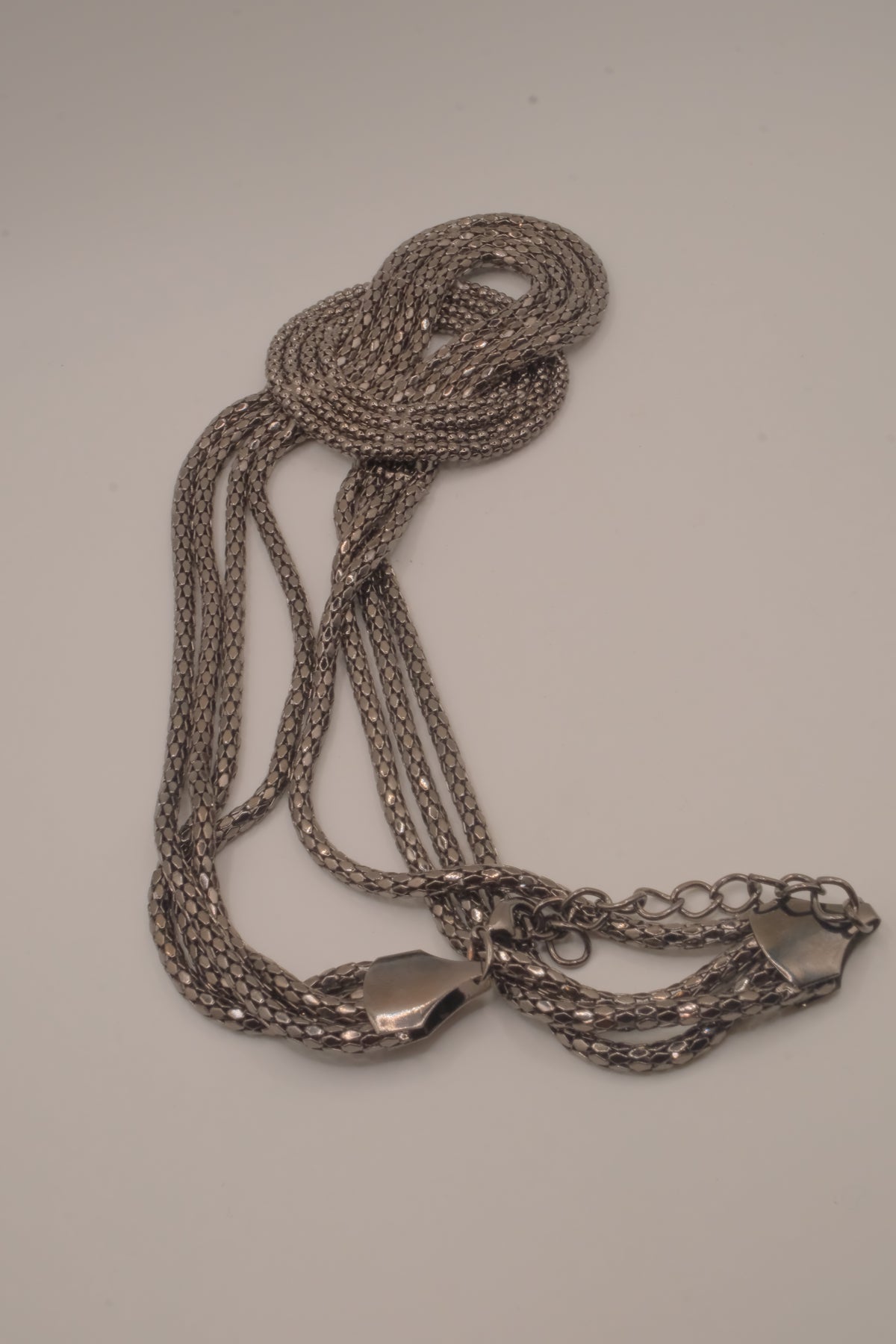 Vintage multi-strand gunmetal mesh statement knot necklace