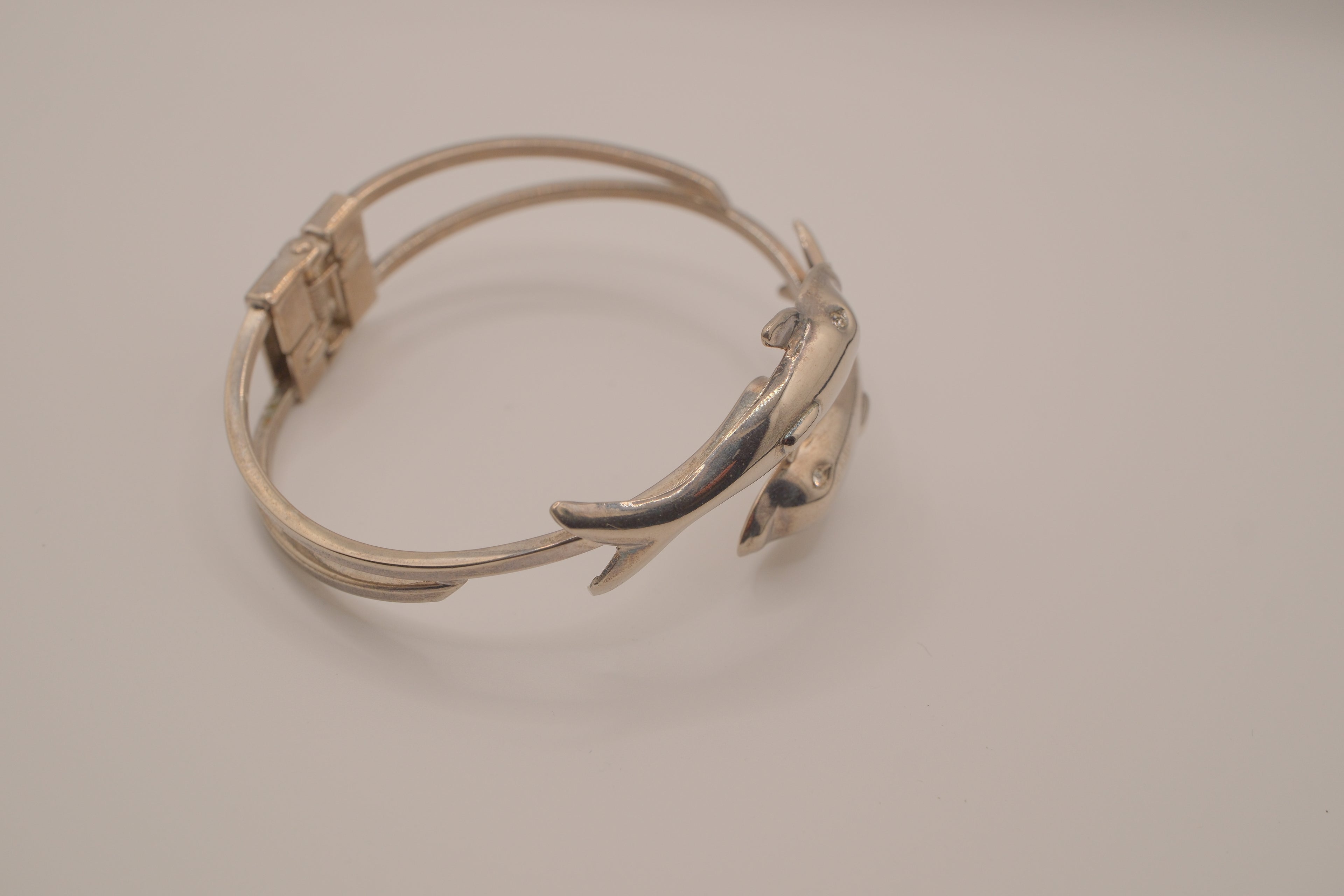 Vintage double dolphin bypass hinged bangle bracelet