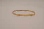 Vintage Monet textured gold-tone bangle bracelet