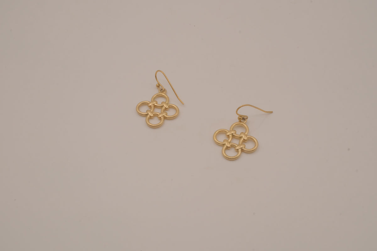 Gold tone interlocking clover drop earrings
