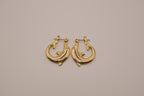Vintage yellow gold dolphin hoop earring