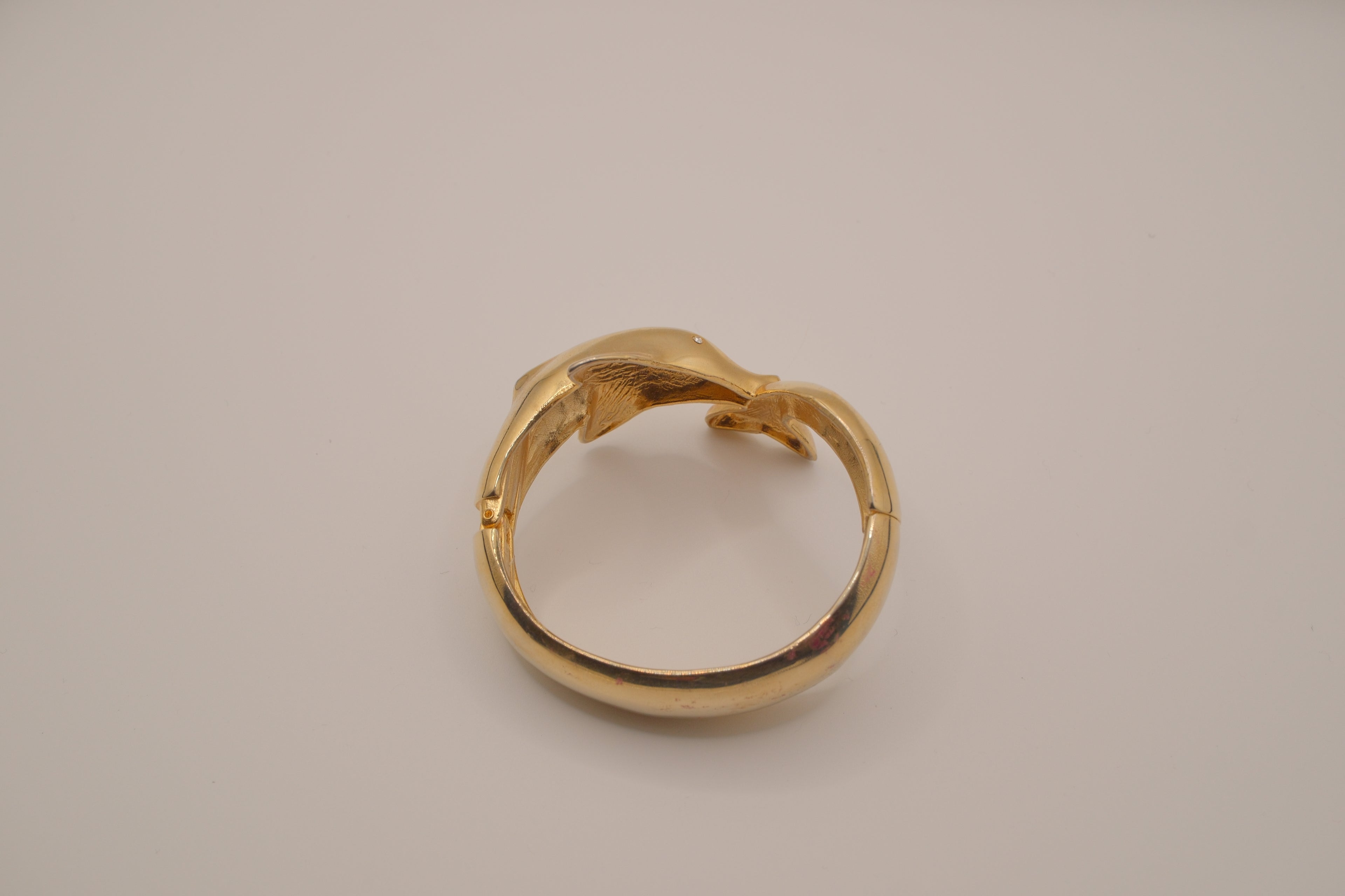 Gold dolphin clamper bangle bracelet