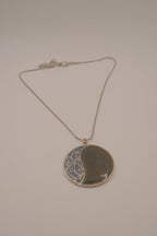 Vintage silver-tone abstract round pendant necklace