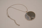 Vintage silver-tone abstract round pendant necklace