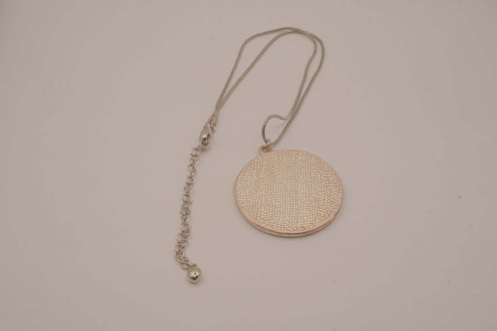 Vintage silver-tone abstract round pendant necklace