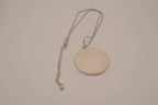 Vintage silver-tone abstract round pendant necklace