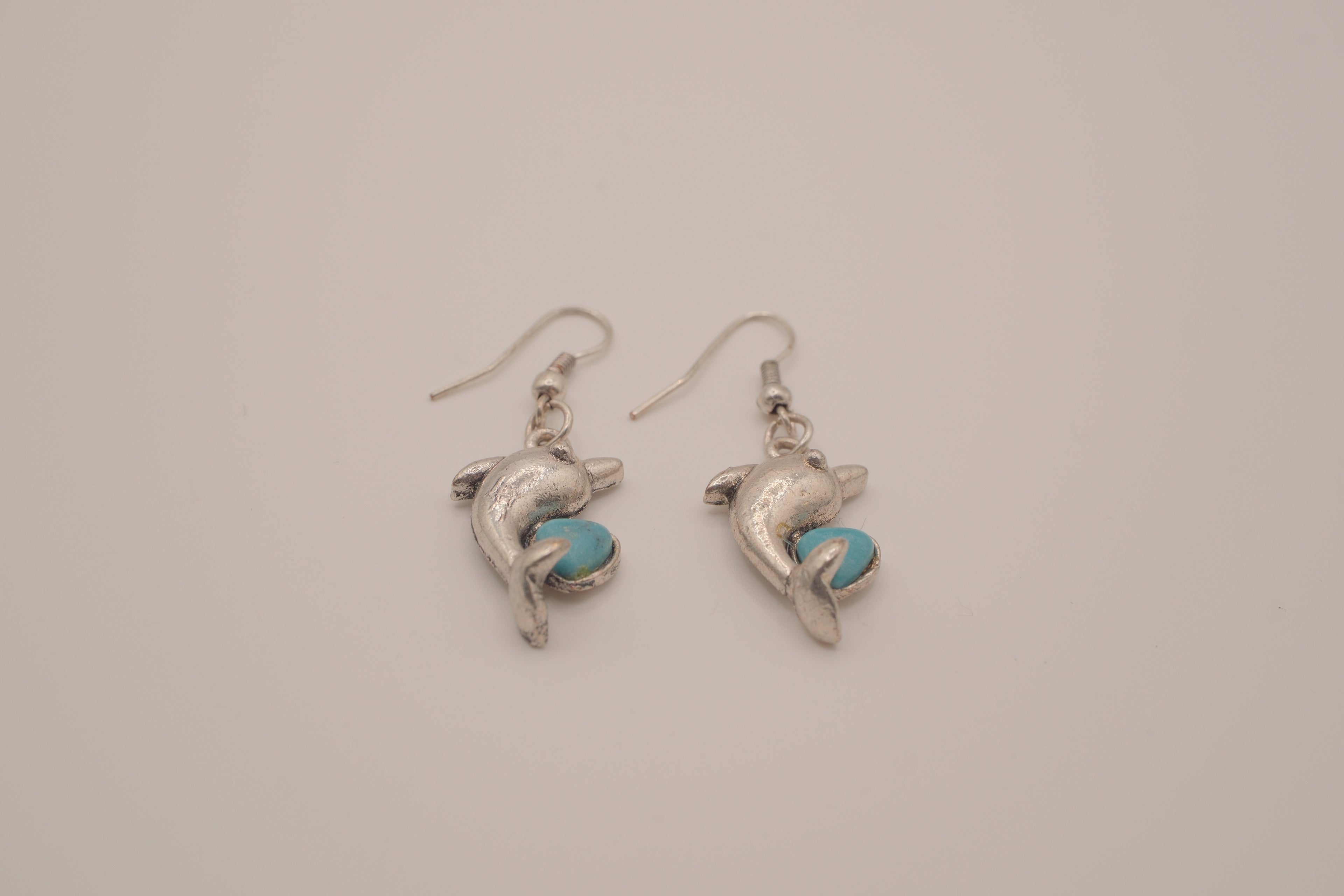 Dolphin dangle earring with faux turquoise inlay