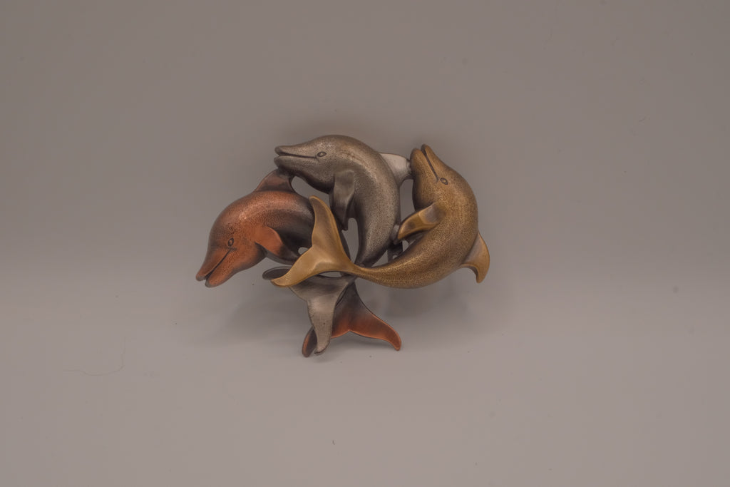 Vintage mixed-metal dolphin family brooch
