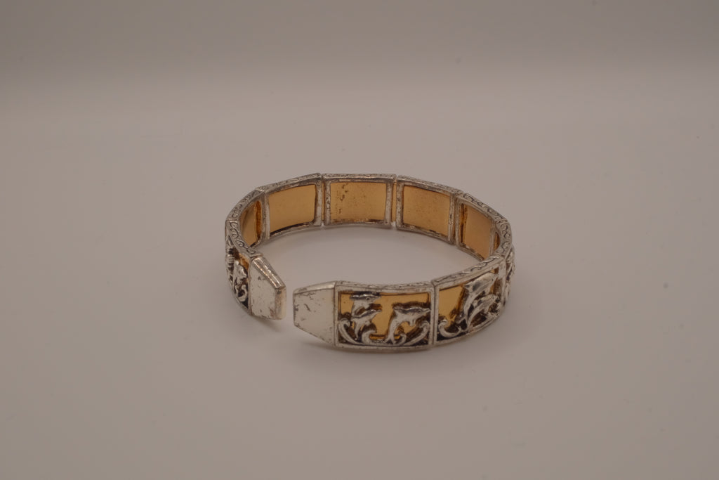 Vintage two-tone Dolphin panel story bracelet