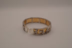 Vintage two-tone Dolphin panel story bracelet