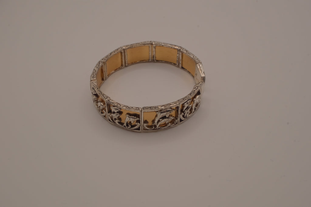 Vintage two-tone Dolphin panel story bracelet