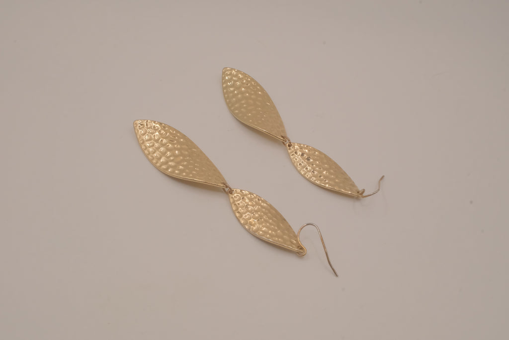 Hammered gold tone double-leaf dangle earrings