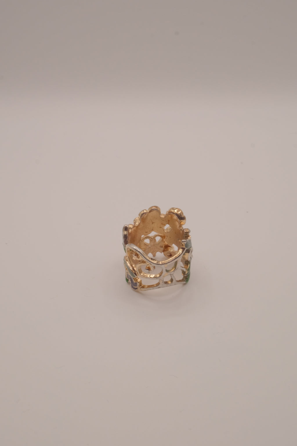 Whimsical, wide-band garden cocktail ring