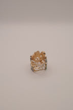 Whimsical, wide-band garden cocktail ring