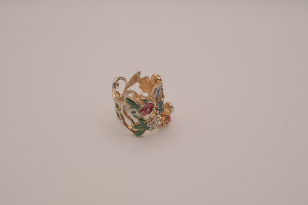 Whimsical, wide-band garden cocktail ring