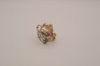 Whimsical, wide-band garden cocktail ring
