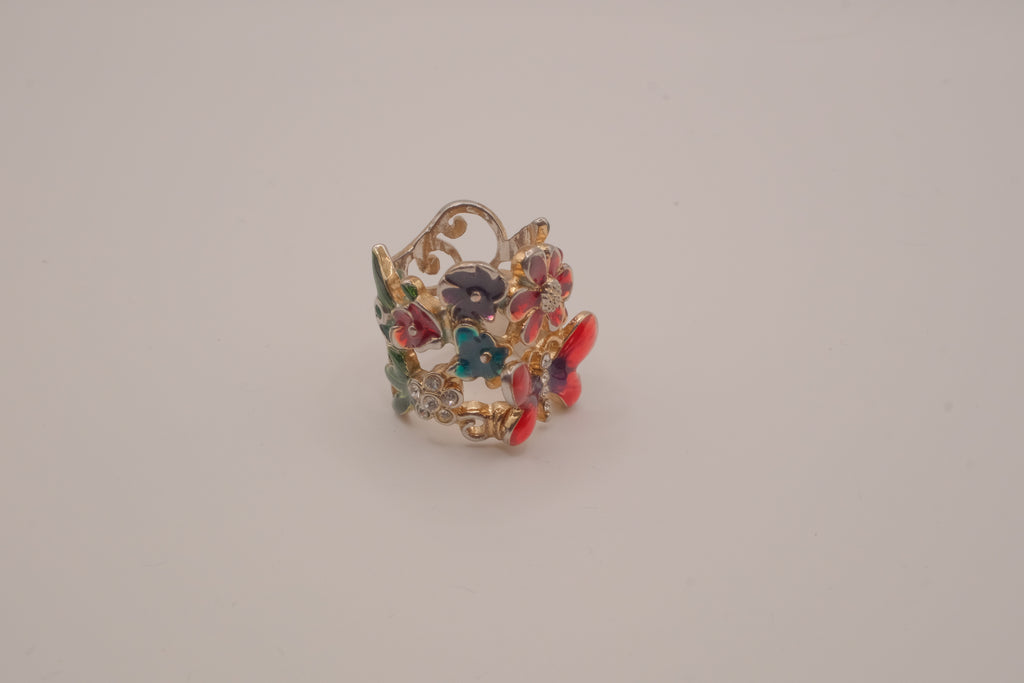 Whimsical, wide-band garden cocktail ring
