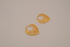 Gold-toned heart-shaped filigree hoop earrings