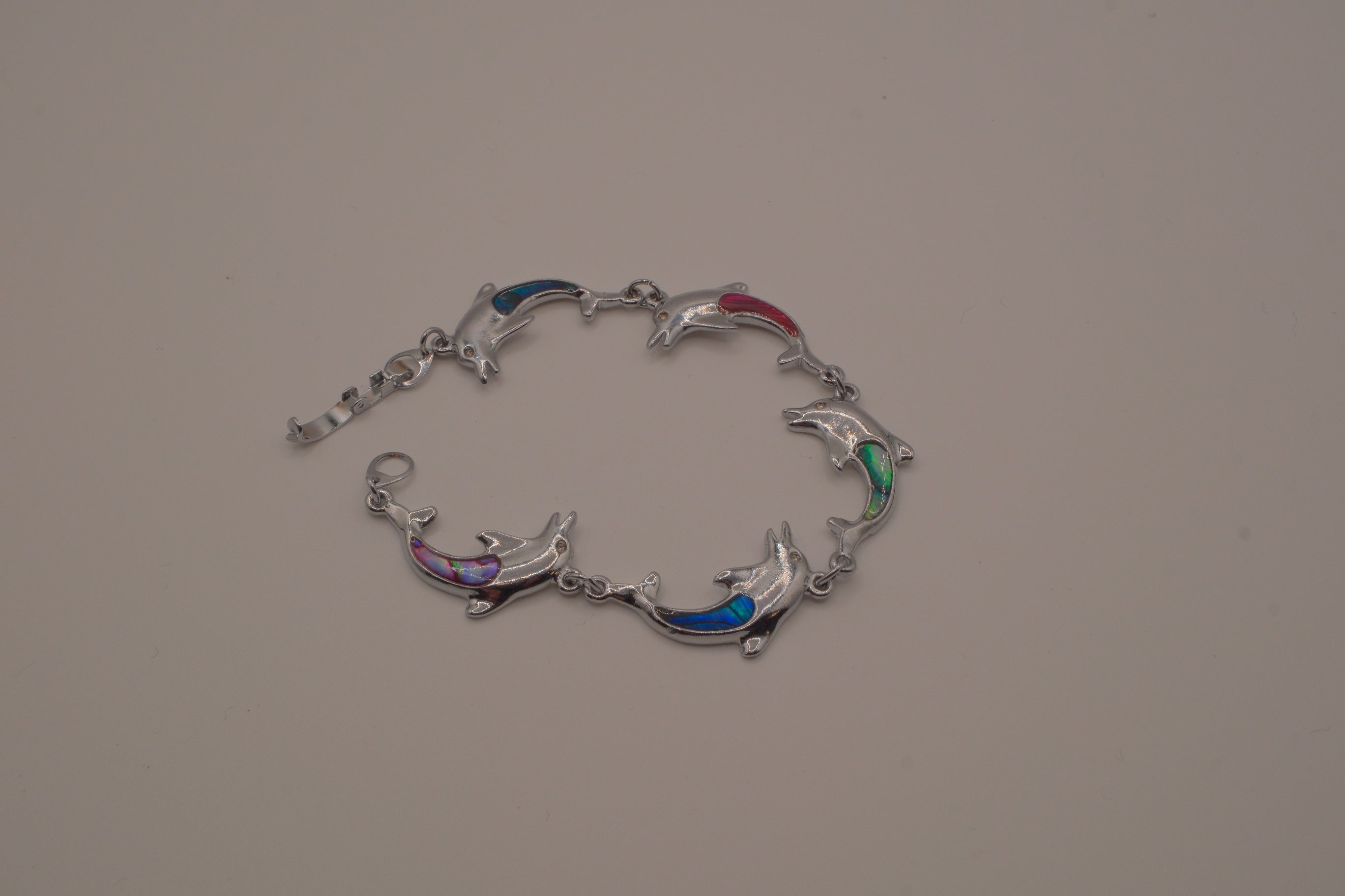 Abalone linked dolphin bracelet
