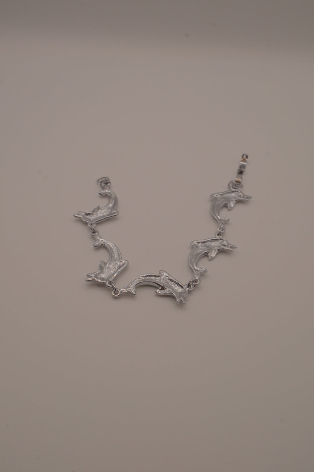 Abalone linked dolphin bracelet