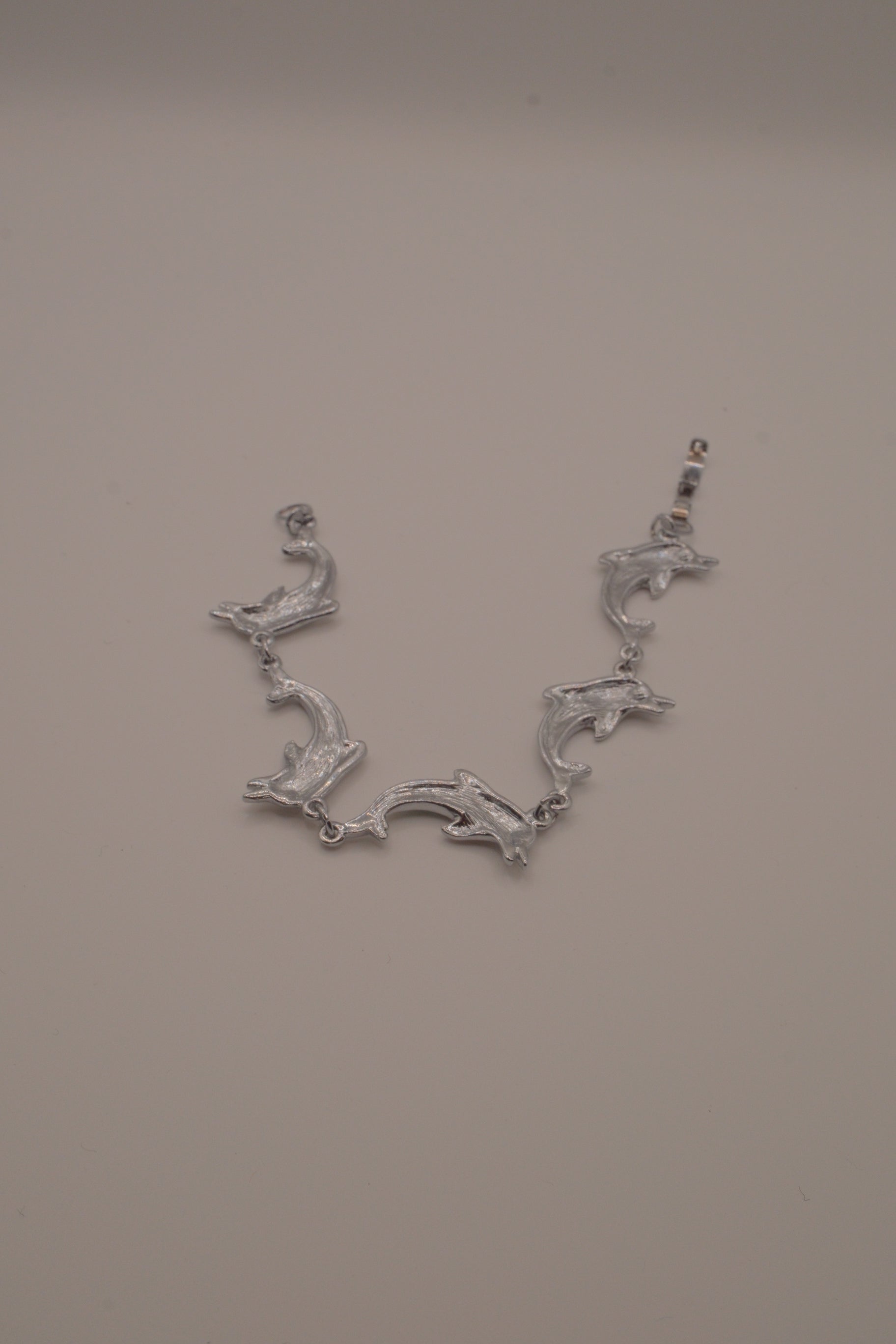 Abalone linked dolphin bracelet