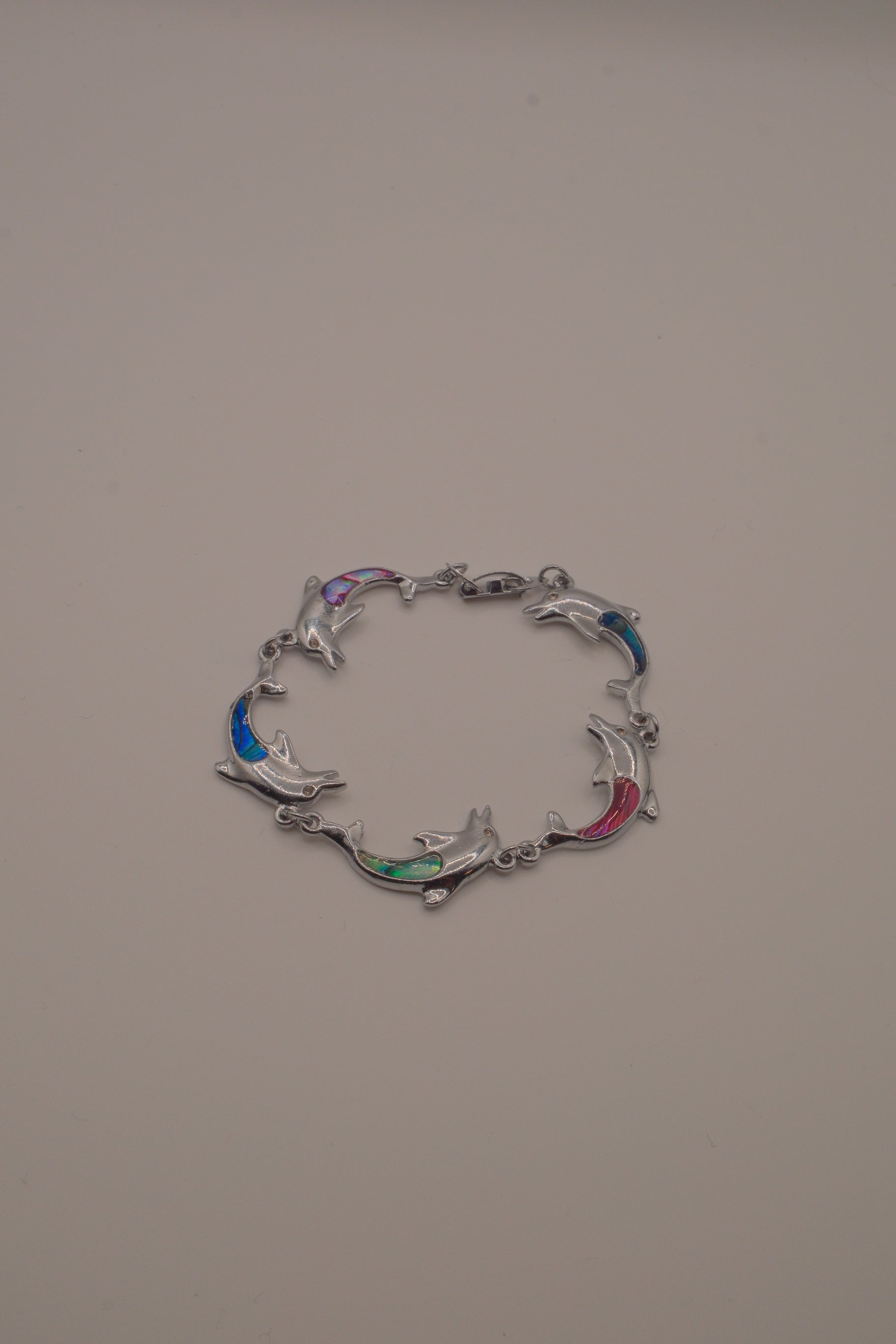 Abalone linked dolphin bracelet