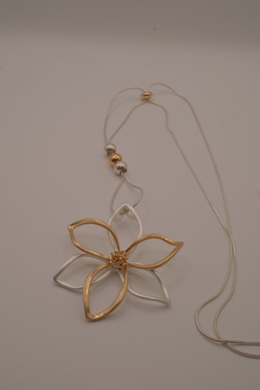 Two-tone openwork flower pendant Bolo tie necklace