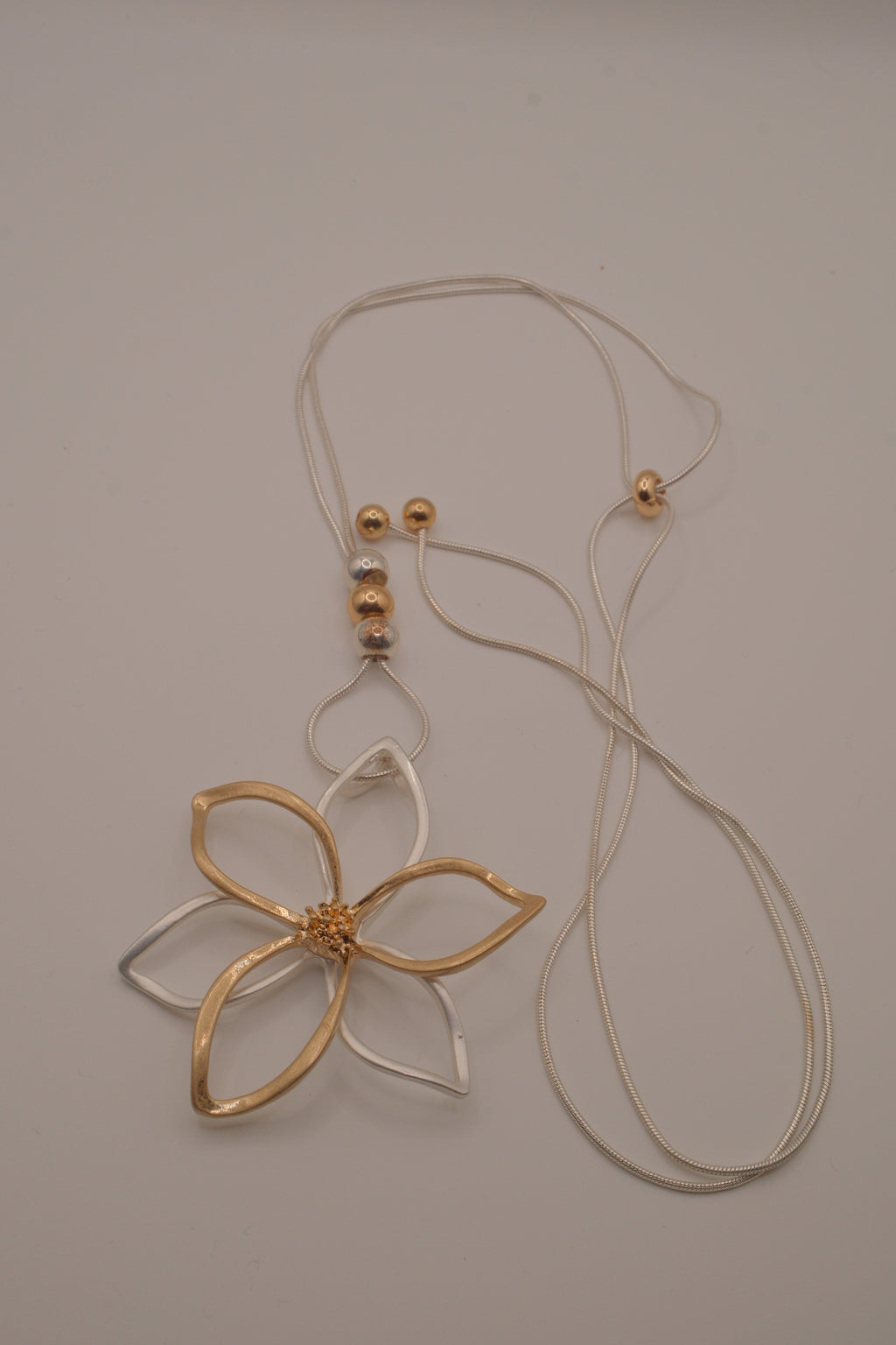 Two-tone openwork flower pendant Bolo tie necklace