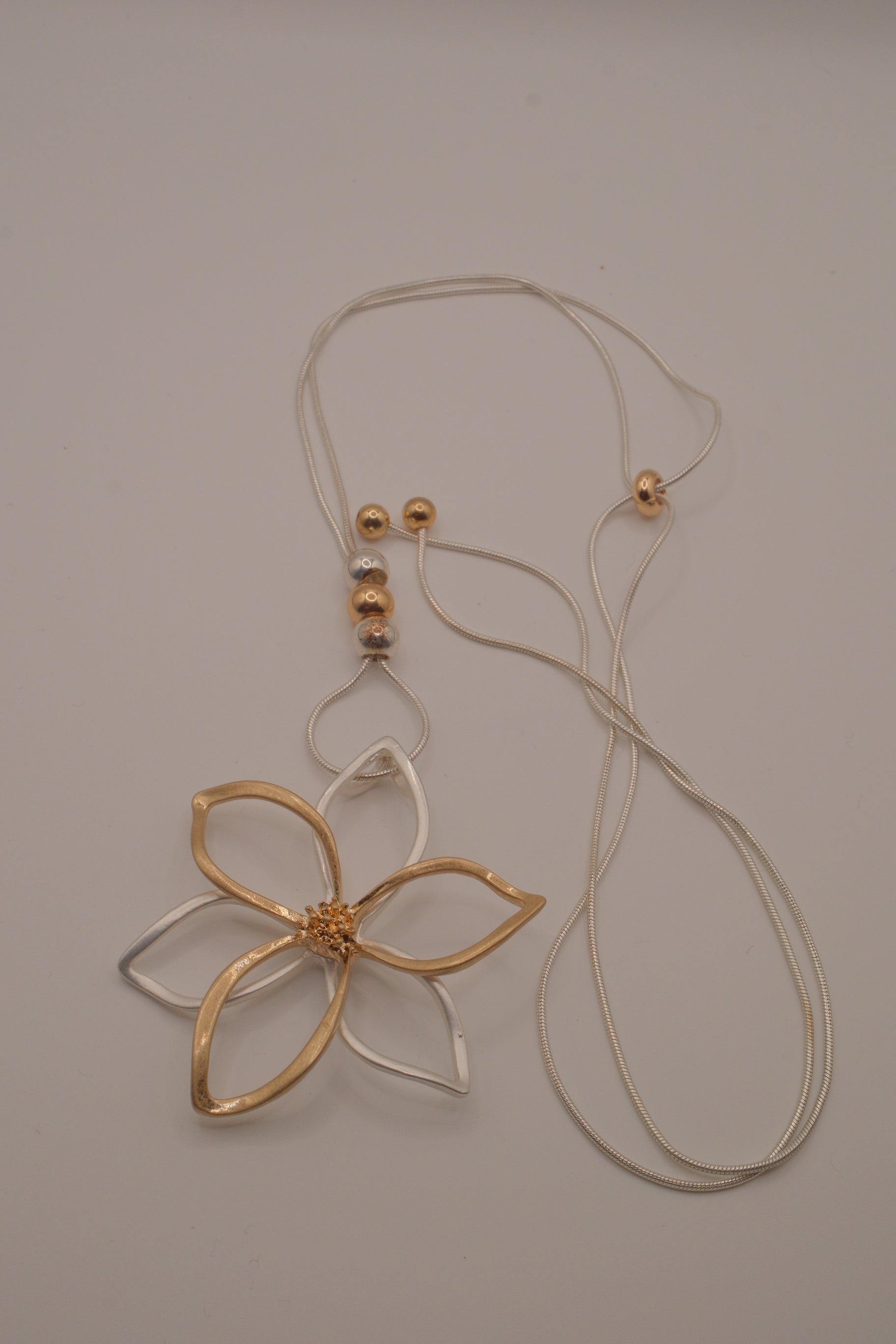 Two-tone openwork flower pendant Bolo tie necklace