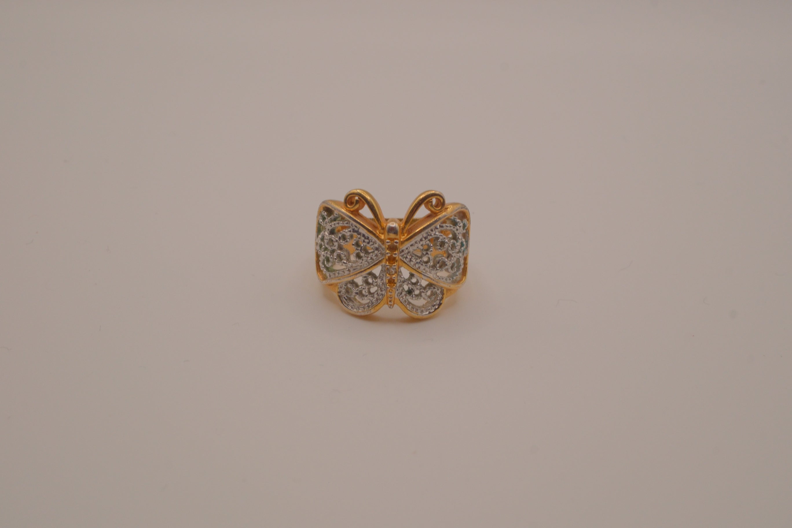 Two-tone butterfly statement ring