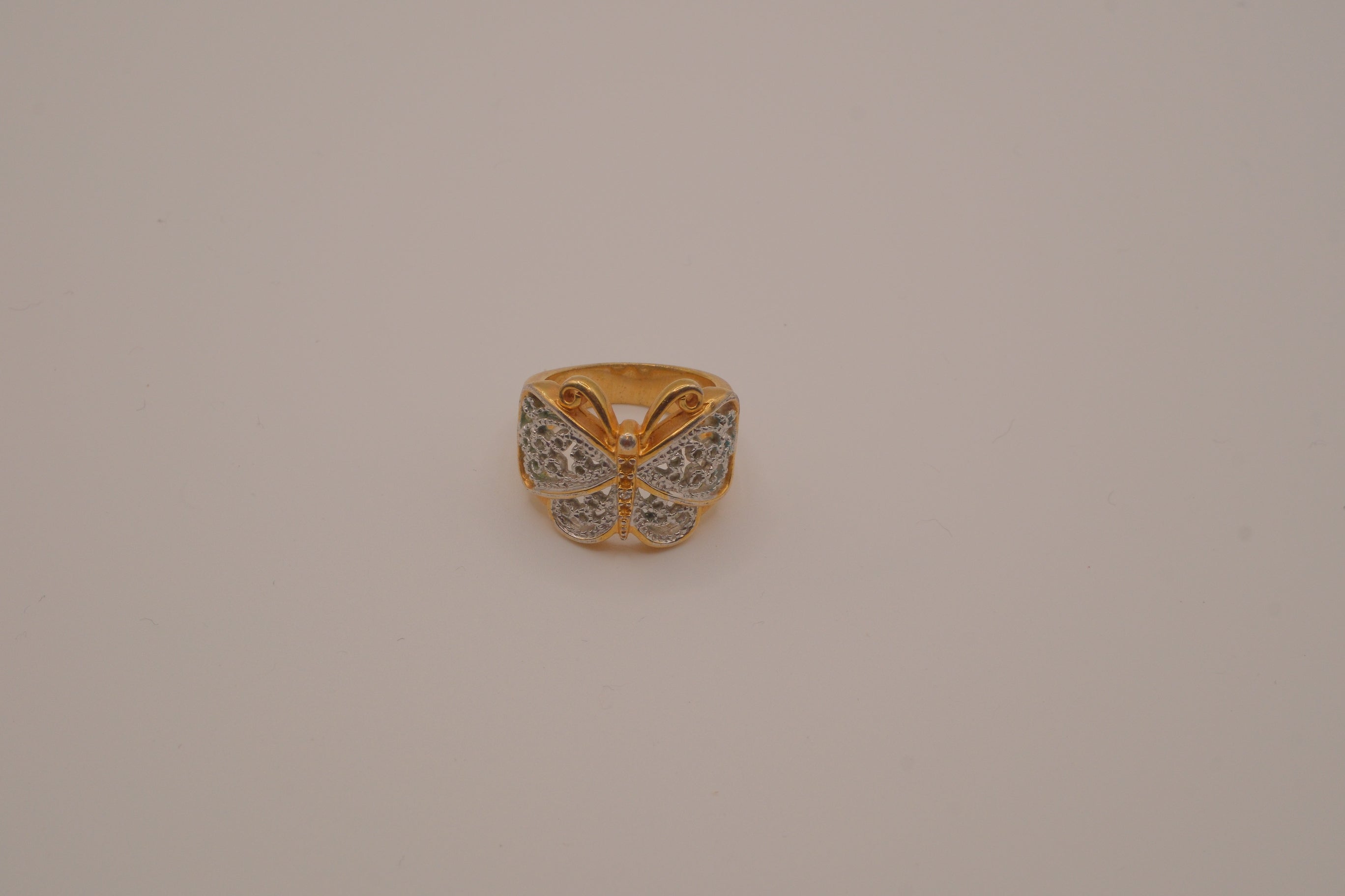 Two-tone butterfly statement ring