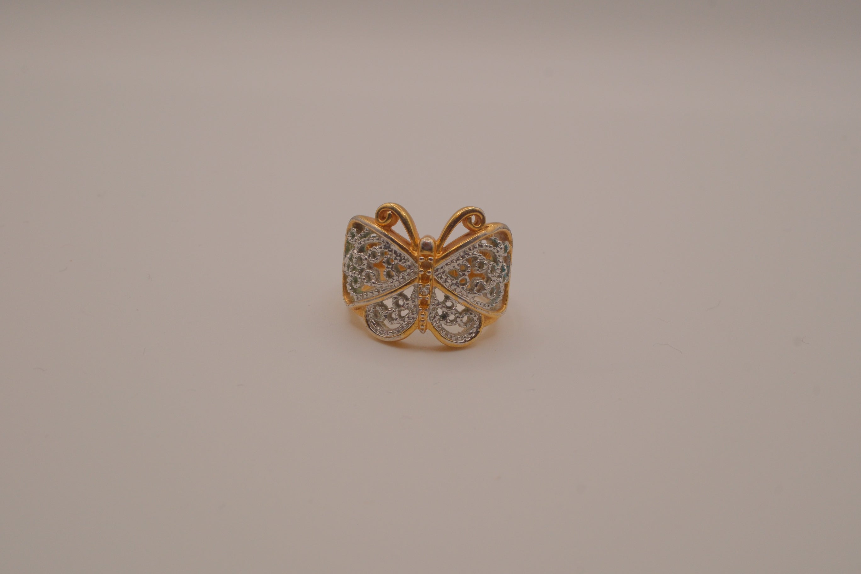 Two-tone butterfly statement ring